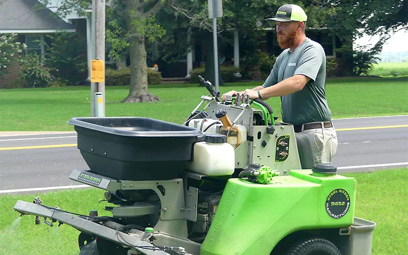 Tech working on lawn