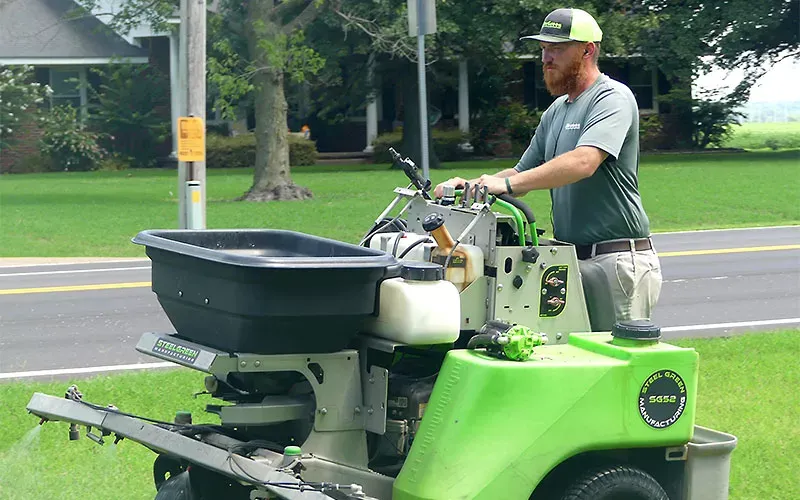 Tech working on lawn